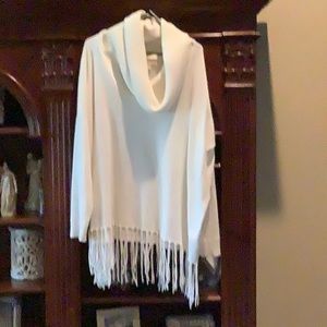 Cowl neck sweater with fringe